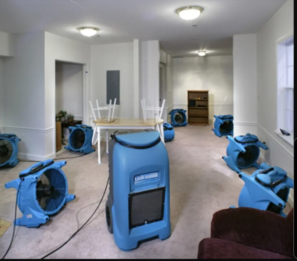 Air movers and dehumidifier setup for Water Damage Restoration in South Venice